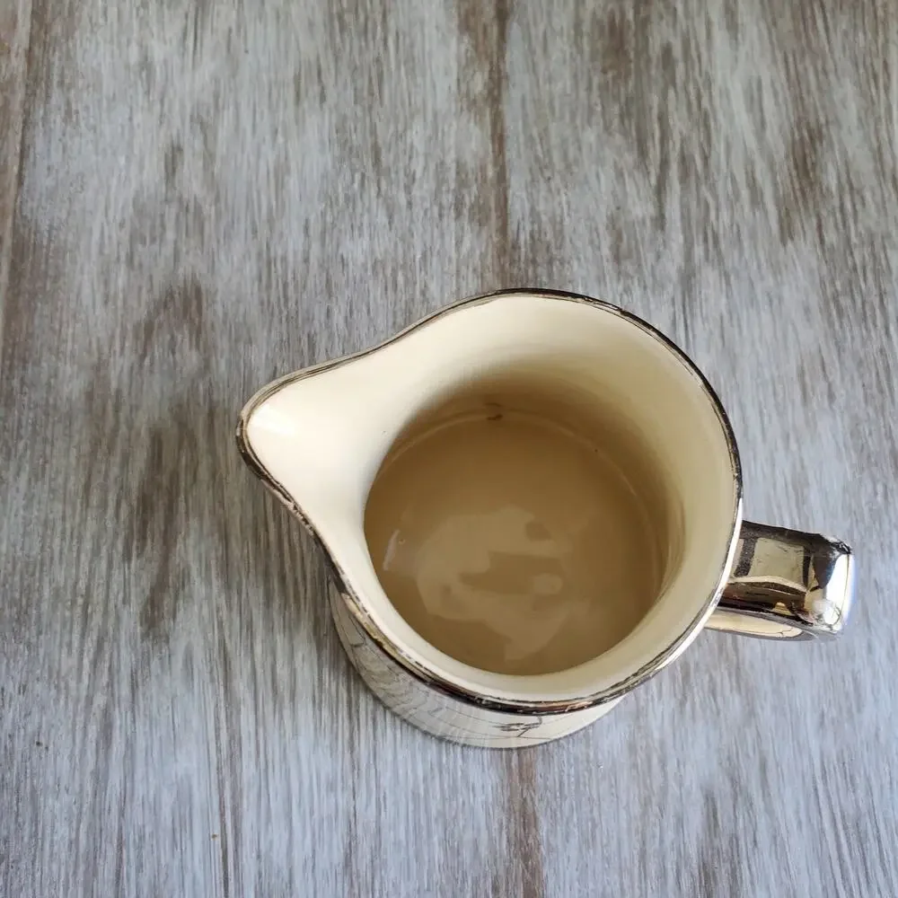 Cream and Silver Ceramic Pitcher